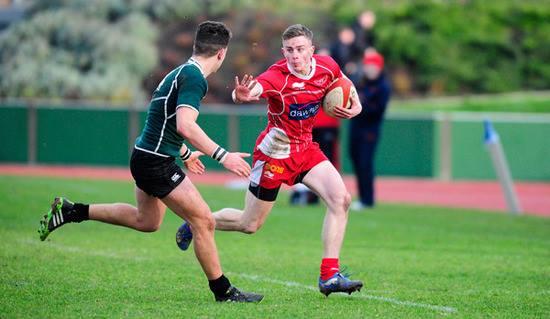 Gethin Gibby looks to hand off an opponent